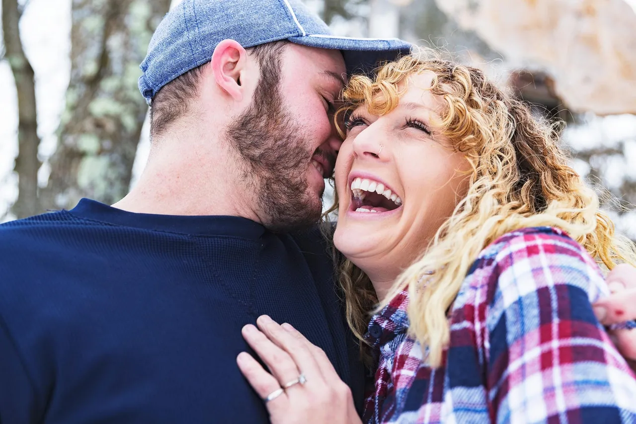 Laughing couple outdoors