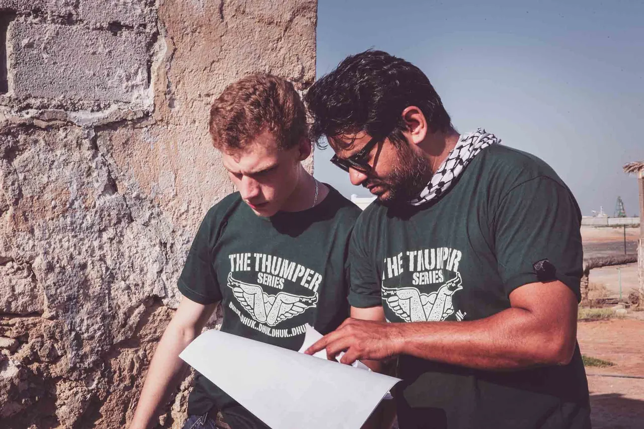 Two men studying a map together