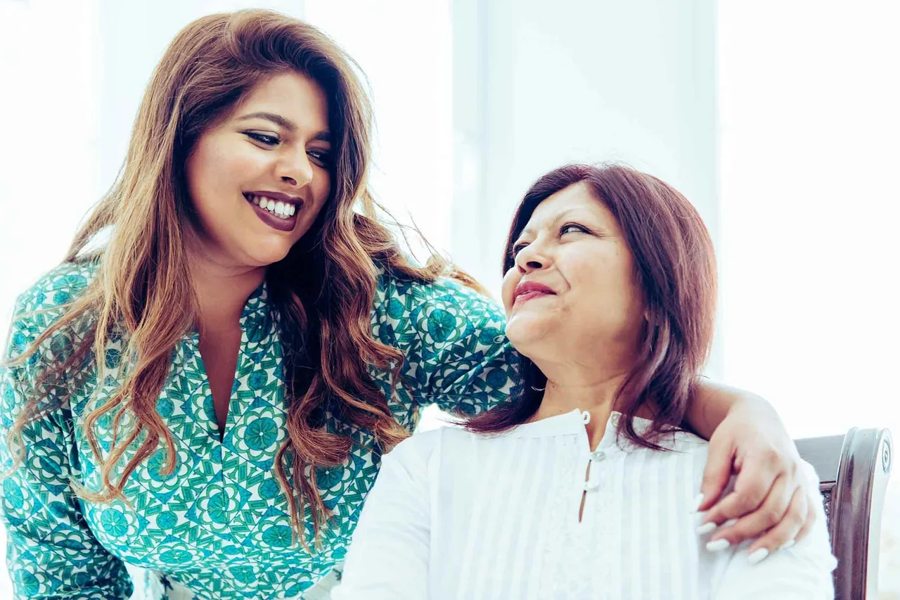 Mother and daughter embracing